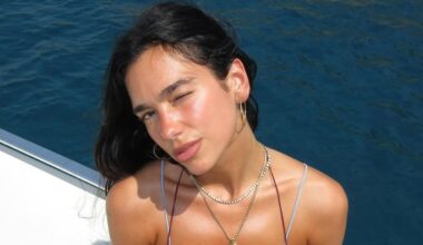 Dua Lipa is the ultimate bikini babe as she jets off for winter sun with lookalike sister