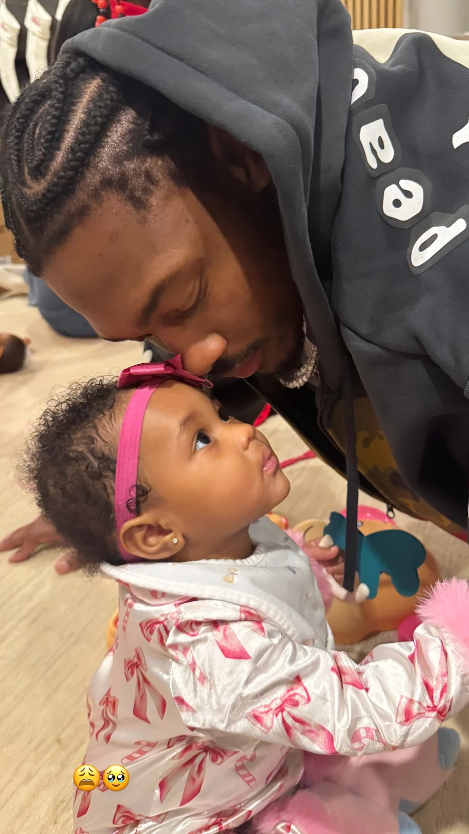 In a second image, the athlete cuddled up to his daughter, whom he shares with Cayy Benji. Stefon Diggs/Instagram