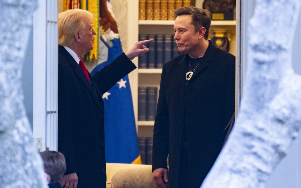 US President Donald Trump and Elon Musk (R) speak before departing the White House on his way to his South Florida home in Mar-a-Lago in Florida on March 14, 2025.. Trump is spending the weekend at his Florida Mar-a-Lago resort.
