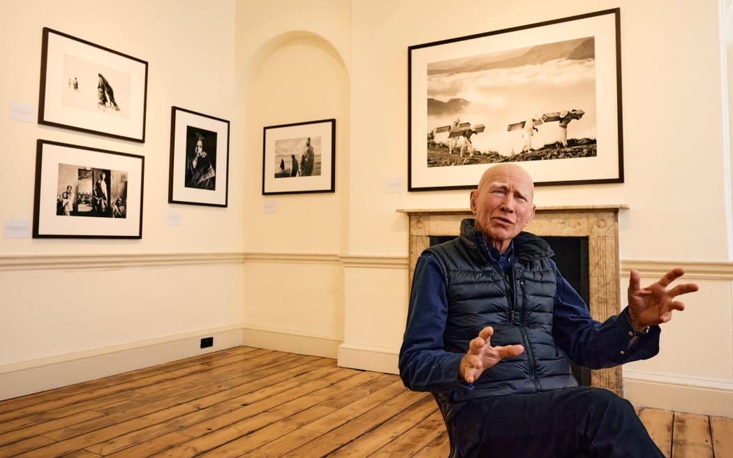 Brazilian photographer Sebastiao Salgado speaks during an interview with AFP, at Somerset House, in London, on April 18, 2024.