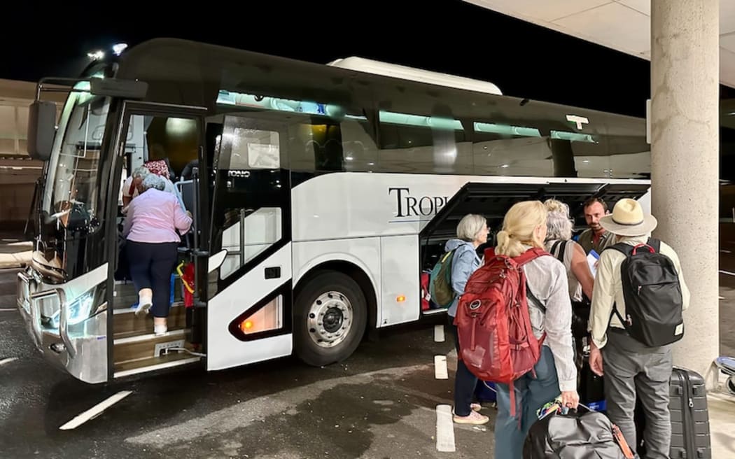 Coral Adventurer passengers were led straight to a charter bus.