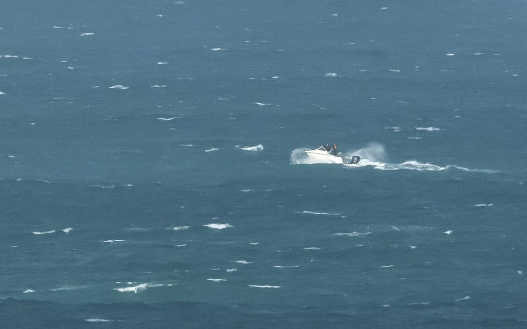 Gordon Pengelly taking his boat out to rescue a capsized yacht.