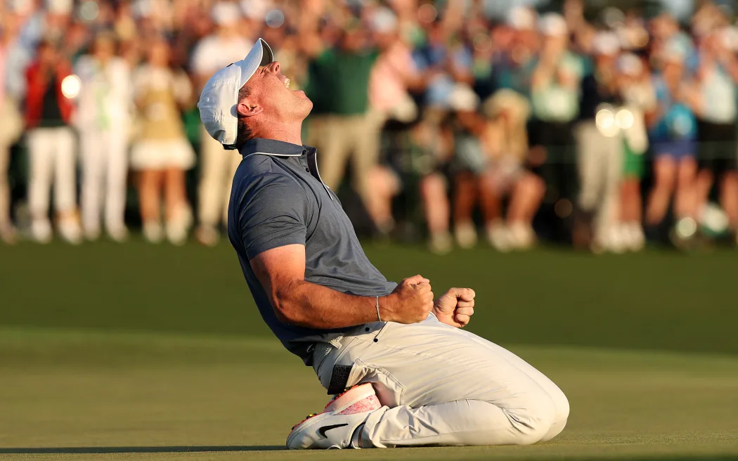 AUGUSTA, GEORGIA - APRIL 13: Rory McIlroy of Northern Ireland celebrates winning the 2025 Masters Tournament after the first playoff hole on the 18th green at Augusta National Golf Club on April 13, 2025 in Augusta, Georgia. Richard Heathcote/Getty Images/AFP (Photo by Richard HEATHCOTE / GETTY IMAGES NORTH AMERICA / Getty Images via AFP)