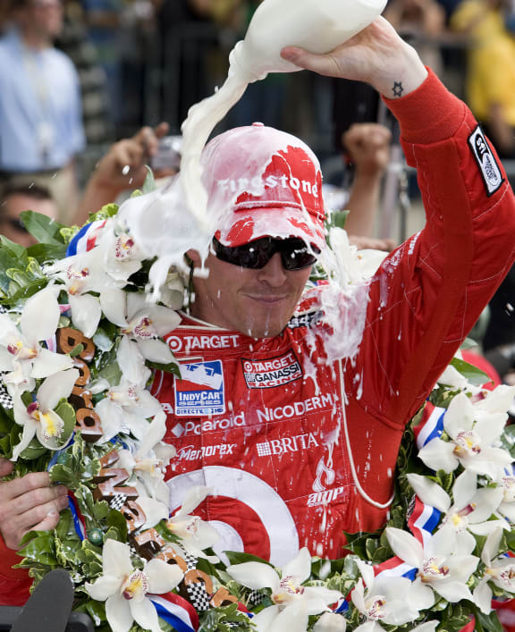 2008 Indianapolis 500 winner Scott Dixon drinks the milk.