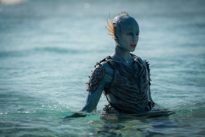539945,TITLE:The War Between The Land And The Sea Gugu Mbatha-Raw as Salt in The War Between the Land and the Sea. She is a humanoid fish-like creature who is wading through a body of water.