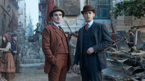 Prime Video/Dan Smith Dónal Finn and Hero Fiennes Tiffin in Young Sherlock
