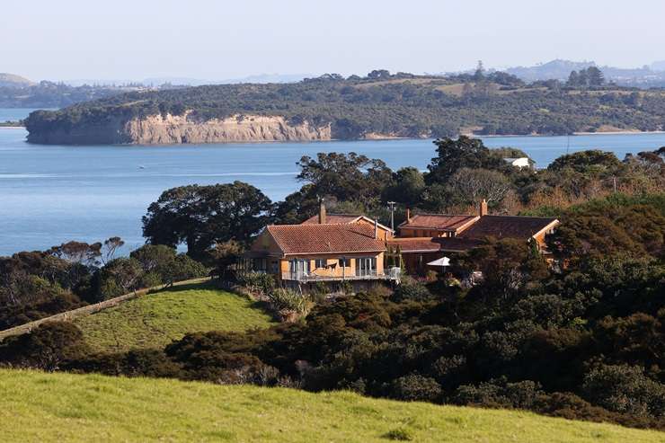High-end estates dot Waiheke's Nick Johnstone Drive, where the median property value is just under <img0m. Photo / Fiona Goodall