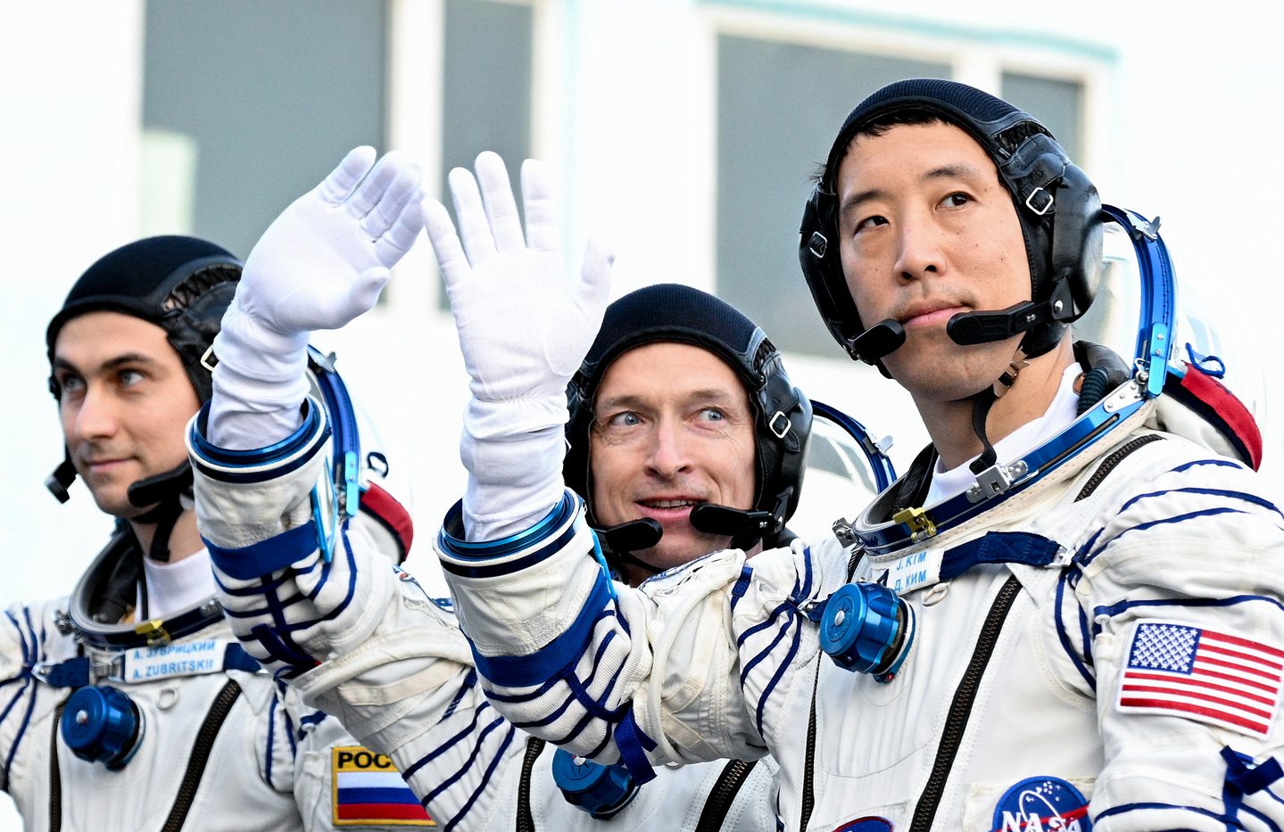 From right to left: Soyuz MS-27 crew members NASA astronaut Jonny Kim, Roscosmos cosmonauts Sergey Ryzhikov and Alexey Zubritsky are seen during a send-off ceremony prior to the launch of the Soyuz 2.1, a booster rocket with the Soyuz MS-27 spacecraft from the Baikonur Cosmodrome, at Kazakhstan on April 8. [TASS/YONHAP]