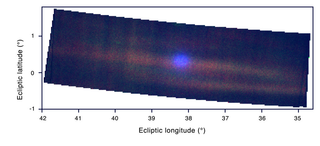 A fuzzy blue blob and two dust tails in an ultraviolet comet photo from NASA's Europa Clipper.