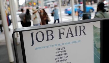 US jobless claims slide to cap a bumpy year for job market