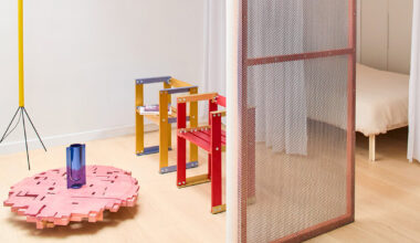 paf atelier + BB architectes organize paris apartment around perforated orange mezzanine