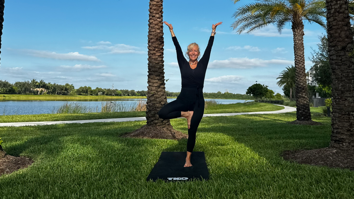Woman does an outdoor yoga flow