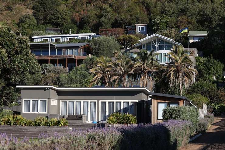 High-end estates dot Waiheke's Nick Johnstone Drive, where the median property value is just under <img0m. Photo / Fiona Goodall