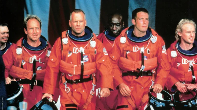 Movie still with the main cast from Armageddon (1998).