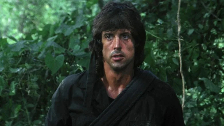 John Rambo walking in the jungle in Rambo: First Blood Part II