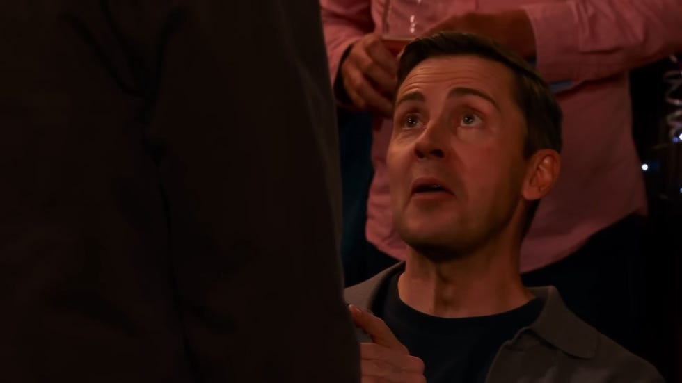 coronation street, todd grimshaw in close up on his knees proposing in front of theo