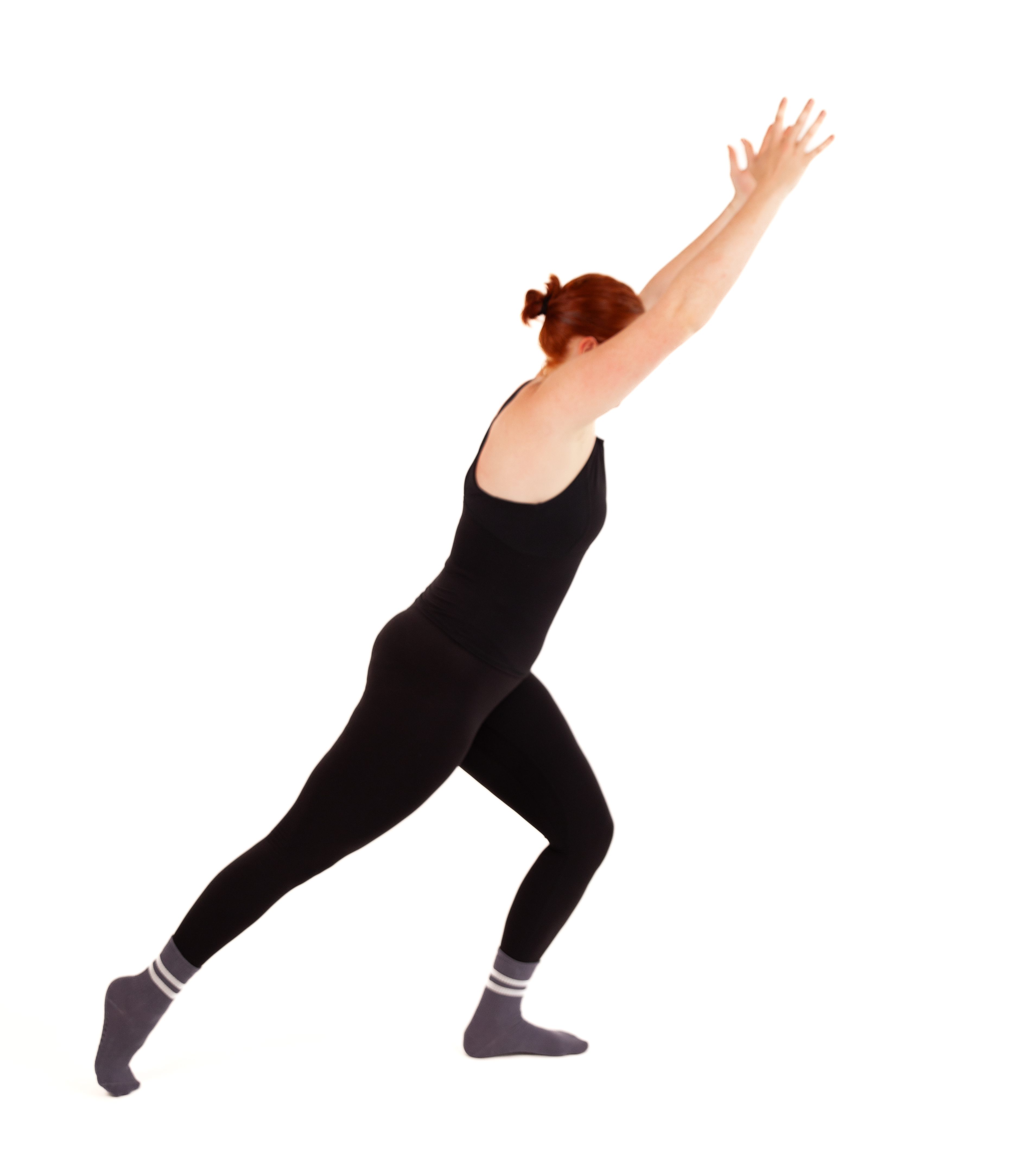 Woman demonstrates Pilates exercise on blue exercise mat against white background