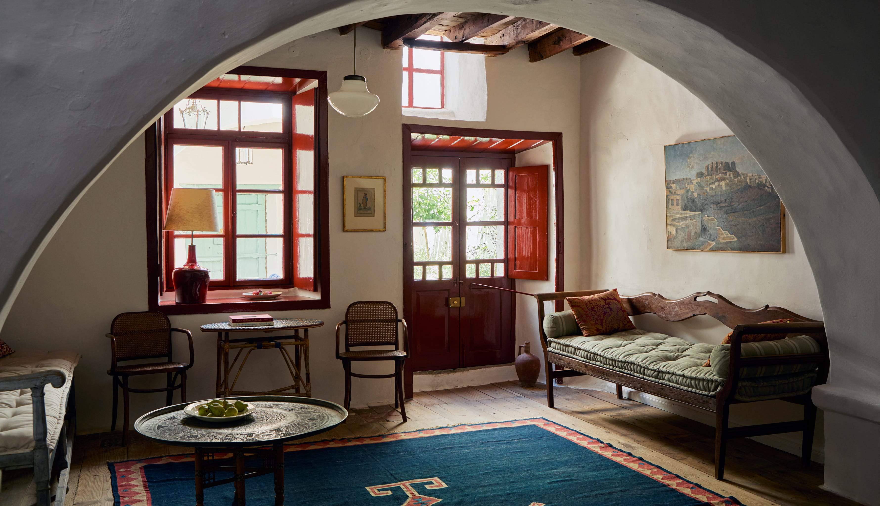 Cozy interior space featuring seating and natural light.