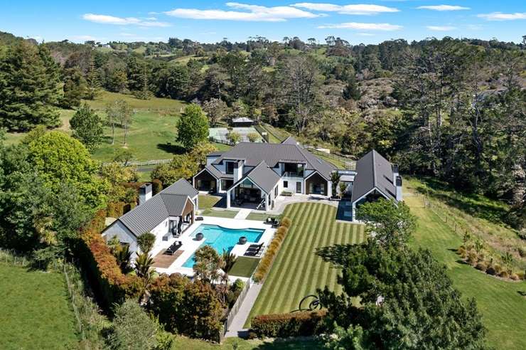 The eight-bedroom, eight-bathroom property at 60a Goldflats Lane, in Auckland's Coatesville, is expected to break post-Covid price records in the suburb. Photo / Supplied