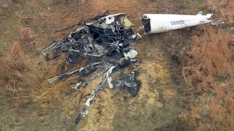 Debris from a helicopter is shown after two helicopters crashed in Hammonton, N.J., on Sunday, Dec. 28, 2025.