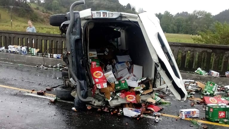 Drinks were strewn all over Riverside Dr after a van carrying liquor rolled this morning. 