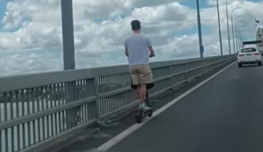 E-scooter rider clings to white line on risky commute over Akl Harbour Bridge