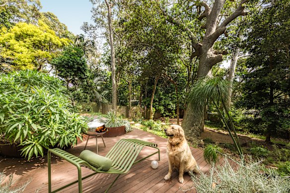 The property is a world unto itself with a lush, vibrant garden. 