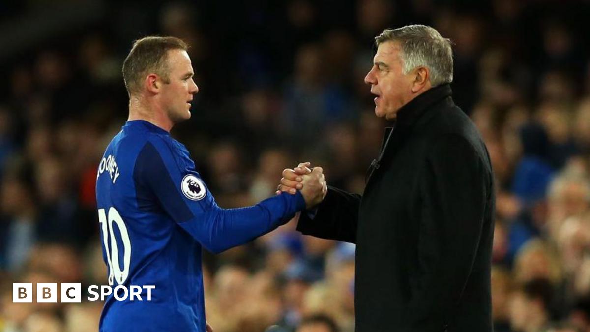 Wayne Rooney shakes hands with Sam Allardyce while he was a player at Everton