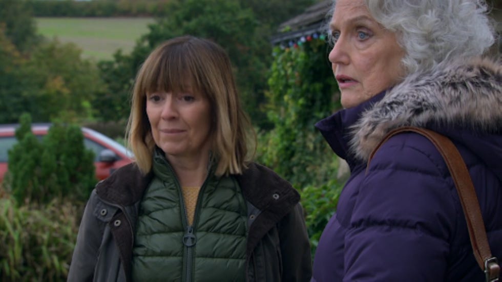 emmerdale rhona mary goskirk two individuals in an outdoor setting engaging in conversation