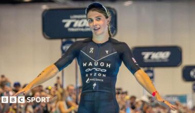 Kate Waugh celebrates winning a race