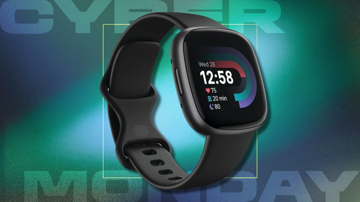 Fitbit Versa 4 black smartwatch on green background with text: Cyber Monday
