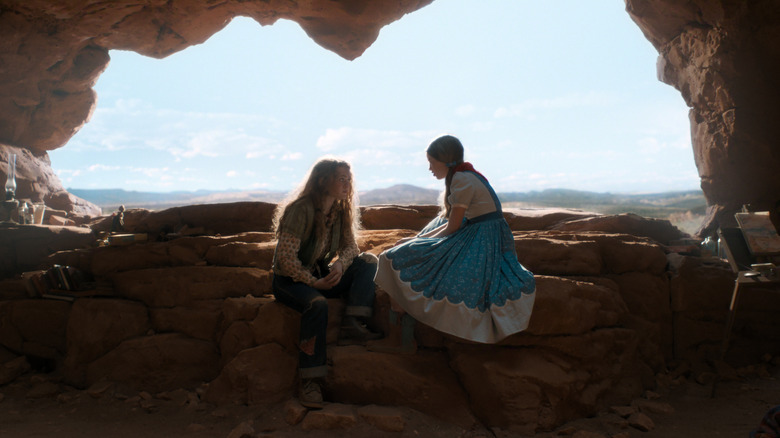 Max and Holly talking in a Nevada cave in Henry Creel's memory world in Strange Things season 5