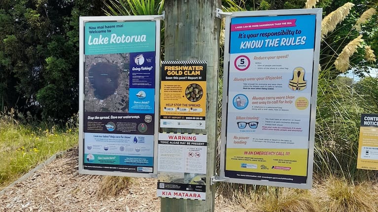 New signs warn lake users about the risk of toxic algal blooms.