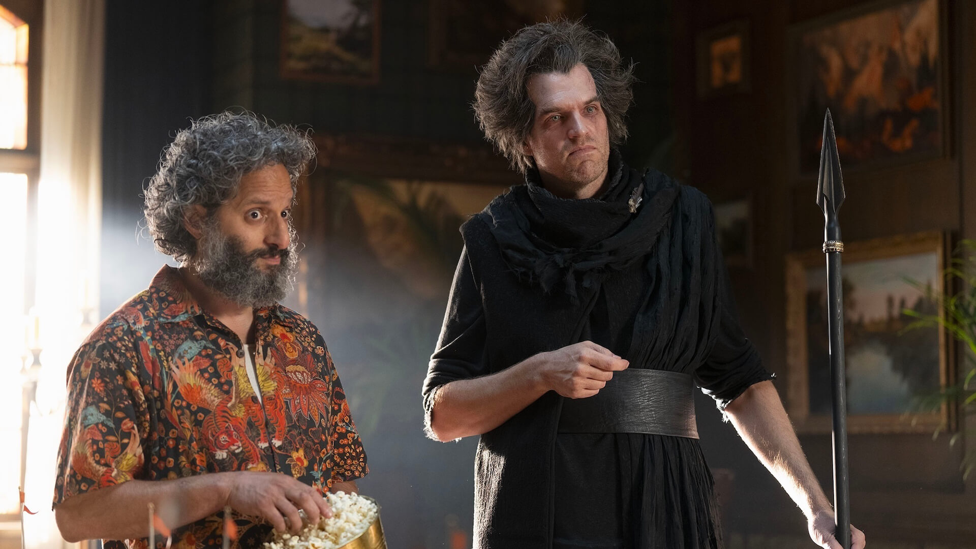 King Tantalus with the camp director in Percy Jackson and the Olympians.