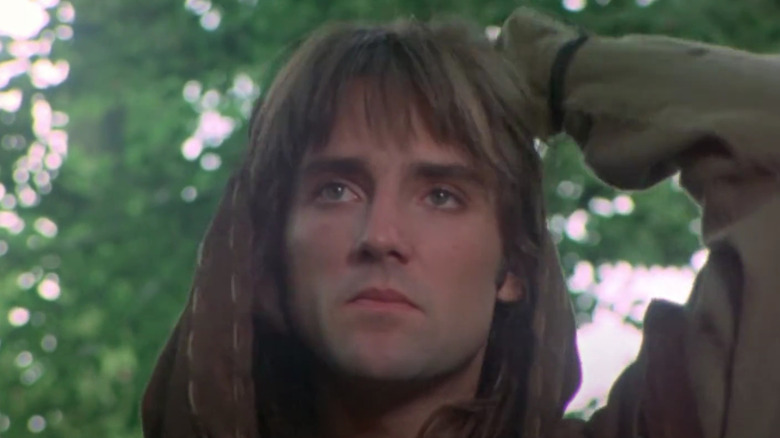 Michael Praed's Robin removes his namesake hood in Robin of Sherwood
