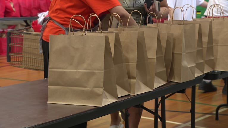 Some of the items available in this year's food parcel, before other selections are made by each family at the other stations.