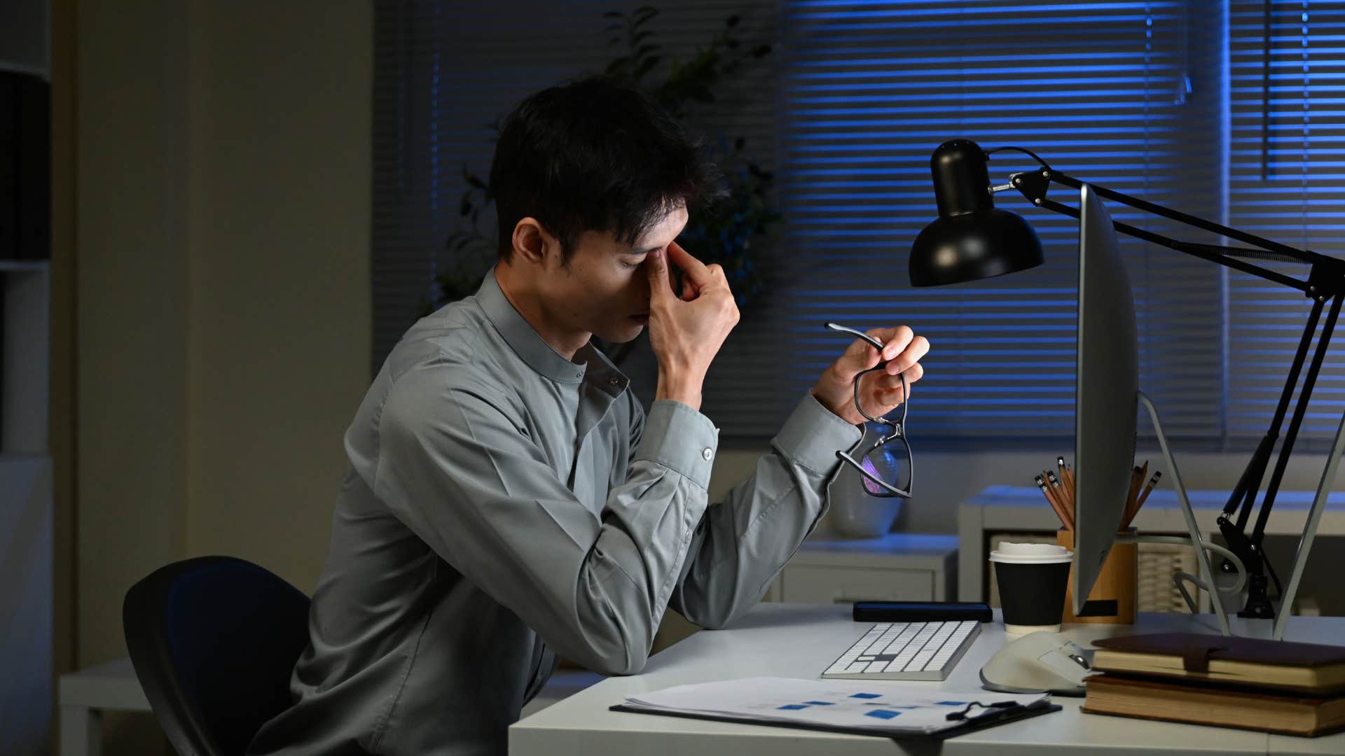 man who is falling behind financially avoiding negotiating pay or a raise