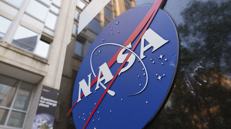 NASA logo out front of administration building.