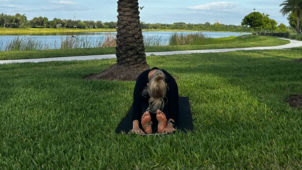 Woman does an outdoor yoga flow