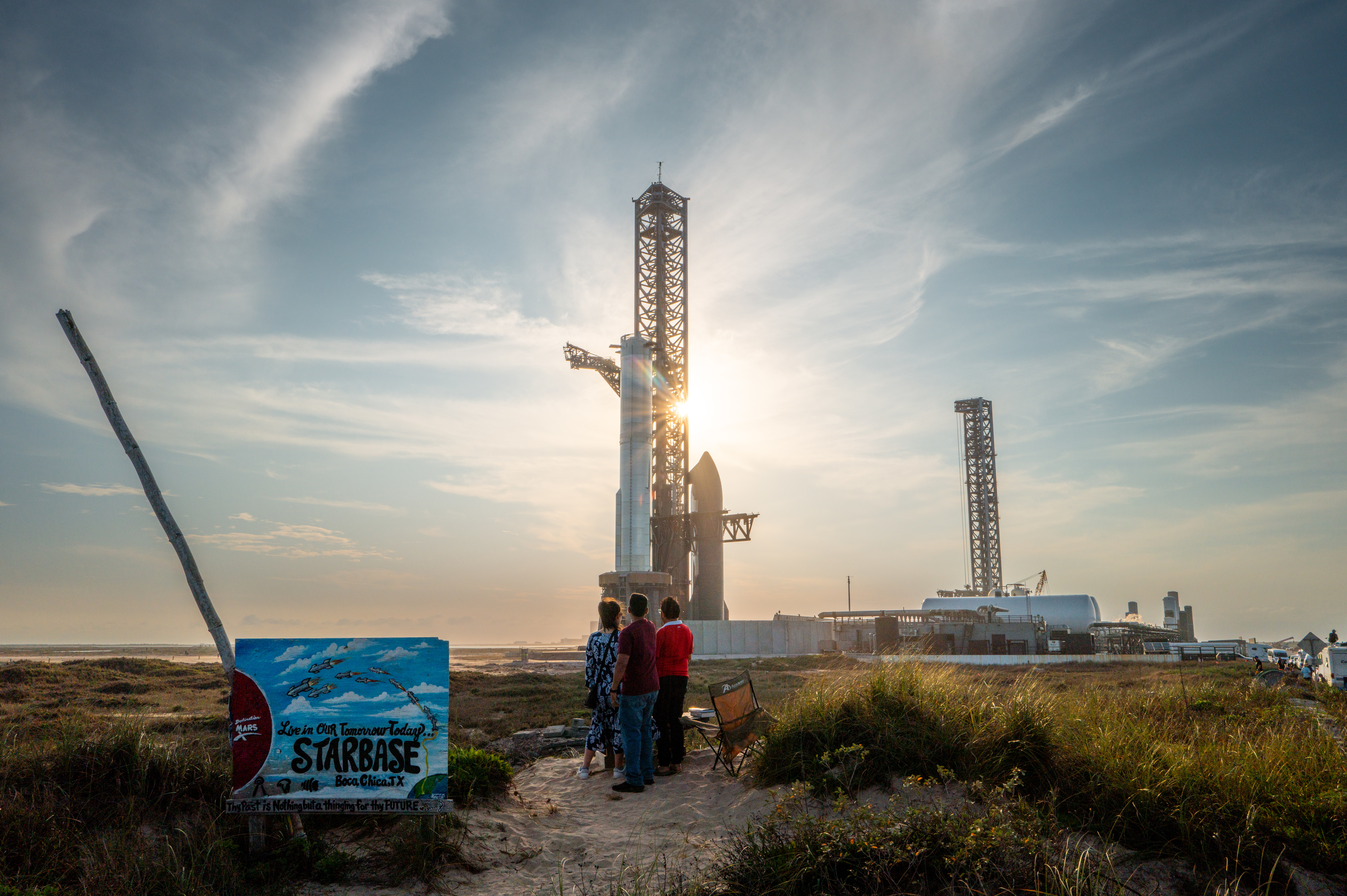 People watching the SpaceX Starship Flight 8 from a beach in Boca Chica, Texas.