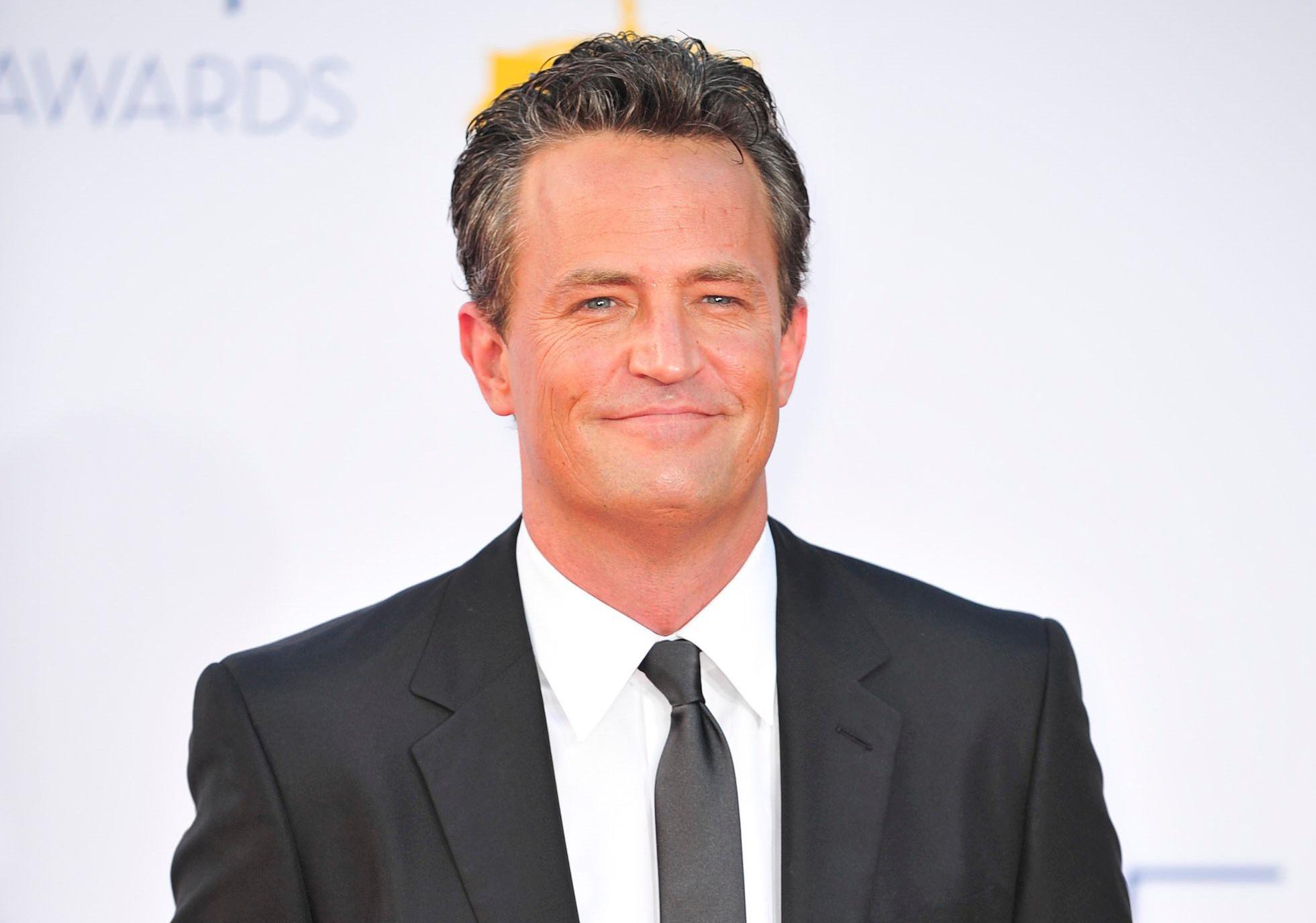 Matthew Perry on the red carpet at the 64th Primetime Emmy Awards.