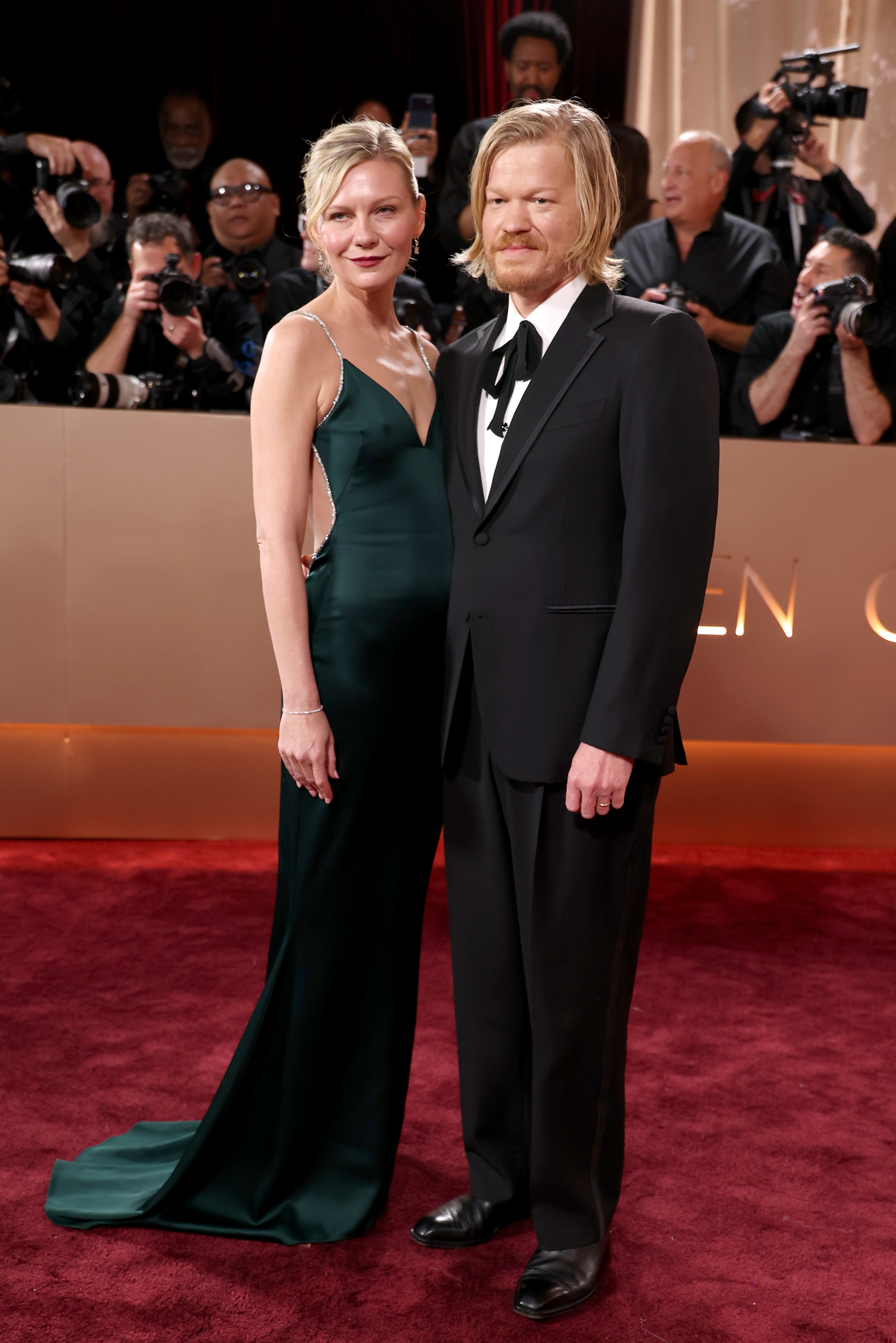 Kirsten Dunst and Jesse Plemons on the red carpet at the 83rd Annual Golden Globe Awards.