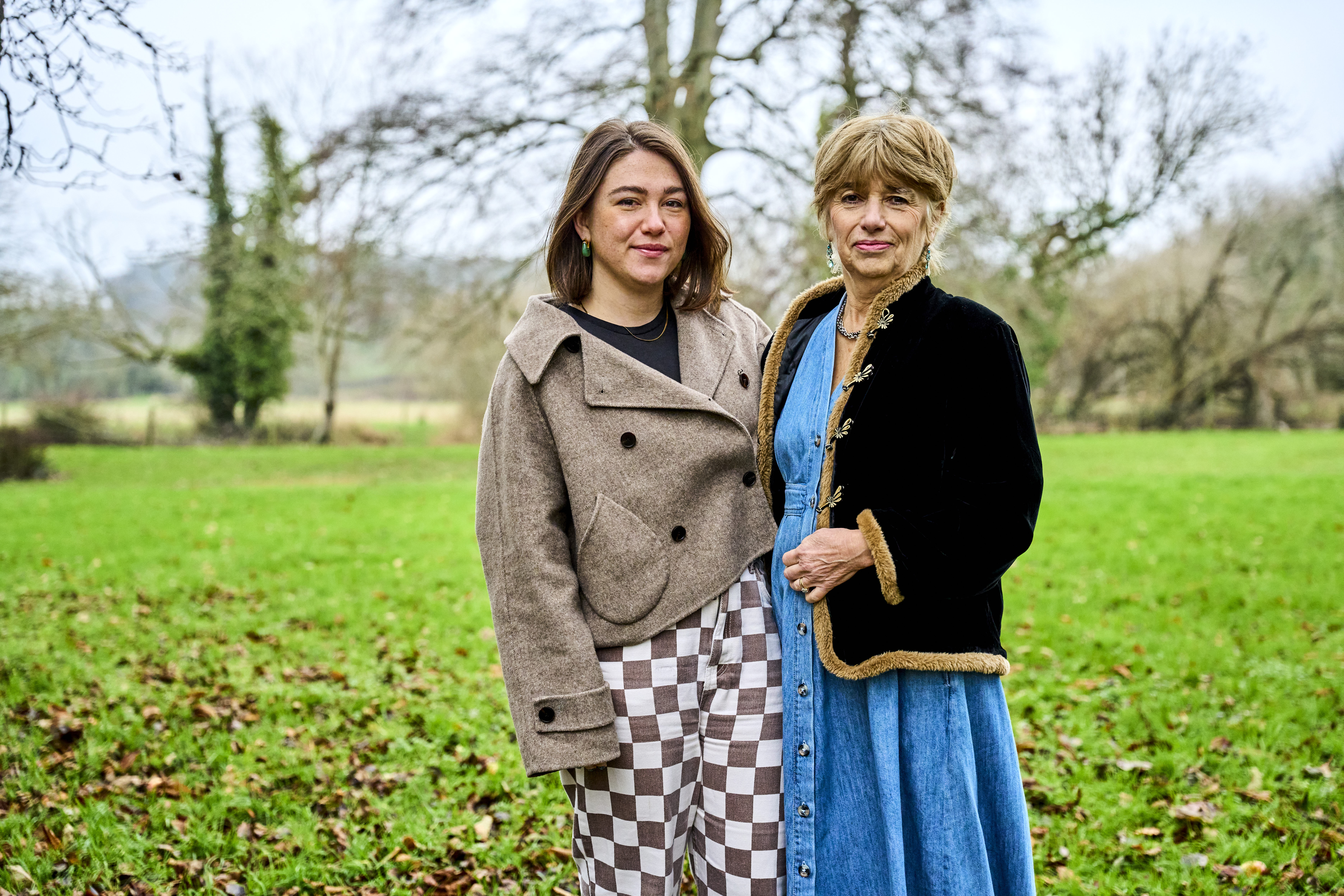 Sophie Samuda and Jill Fraser in a green field.