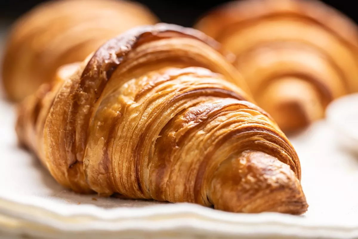 Close-up view of a butter croissant made from puff pastry