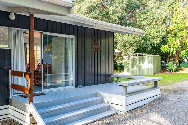 A two-bedroom leasehold bach at 9 Rockell Road, in Whananaki, Whangārei, has a $220,000 price tag. Photo / Supplied