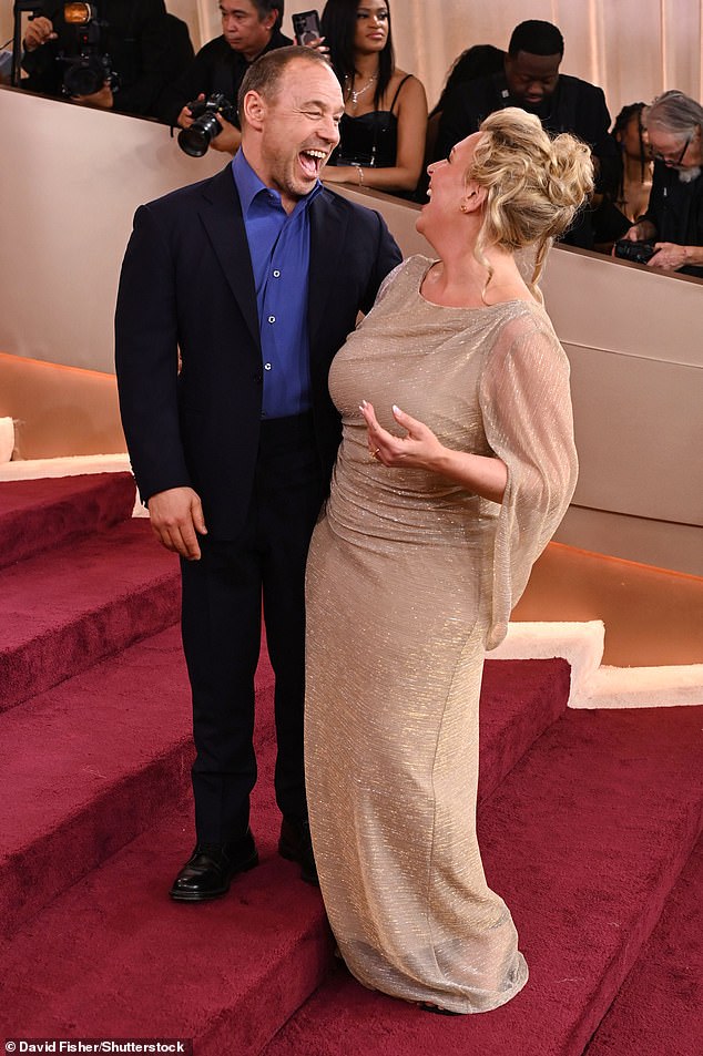 The pair were seen bursting into laughs with one another as they stopped for shots ahead of the annual ceremony