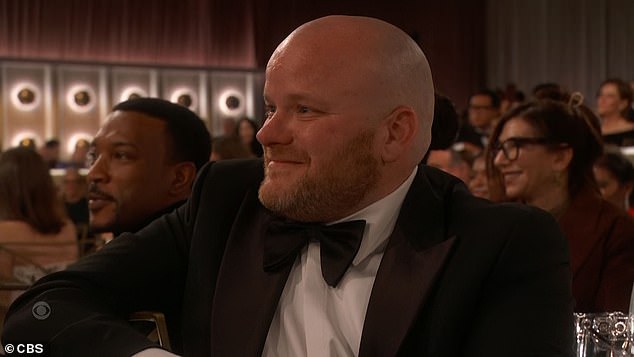 Owen's proud dad Andy watched on as his son made his speech at the awards