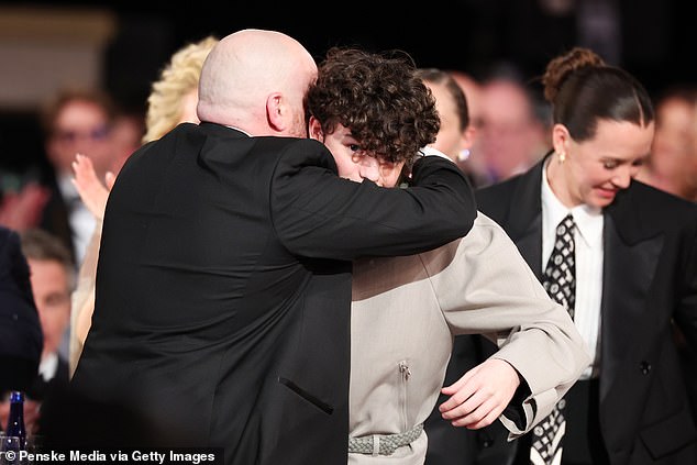 Owen Cooper's teary-eyed proud dad Andy as well as his Adolescence co-star Stephen Graham watched on as the teen made history at the Golden Globes on Sunday