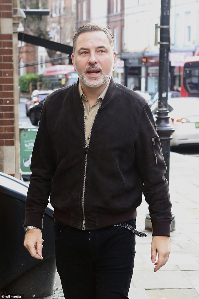 Dressed in jeans and a dark bomber jacket, he offered only a quiet 'hello' to the Daily Mail and made no comment when asked when he might return to television or how he was feeling after what has been a bruising few weeks