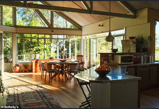 Features include soaring ceilings, Blackbutt flooring and a modern kitchen. (Pictured)